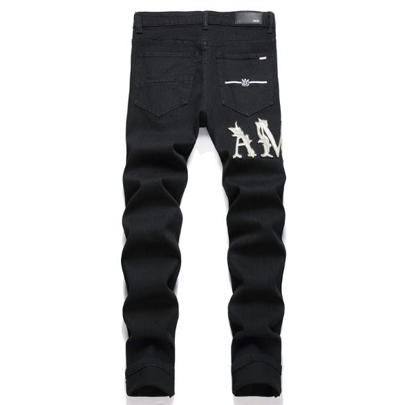 Amiri Jeans Ripped Stretch Jeans