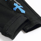 Amiri Jeans Cross Pattern Ripped Stretch Jeans